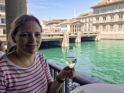 Me having a drink on the terrace of the Storchen hotel overlooking the river