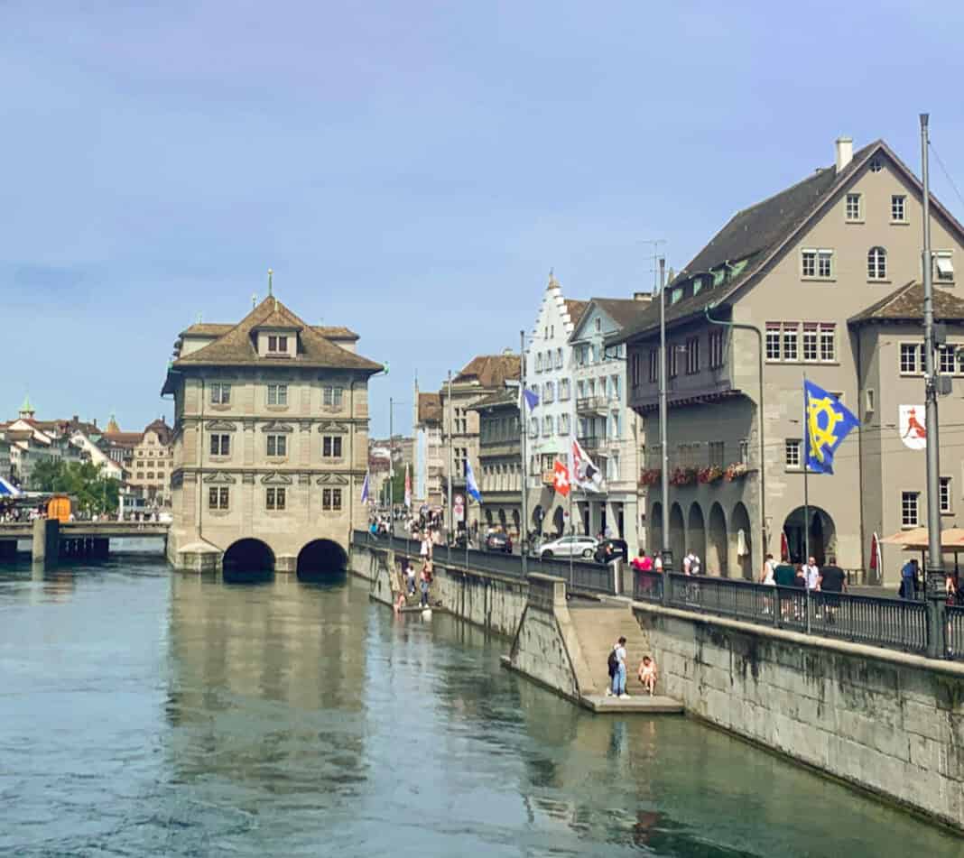 An image of the Rathaus over the water by the old town