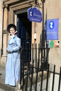 The outside of the Jane Austen Centre in Bath UK with a model of the author outside