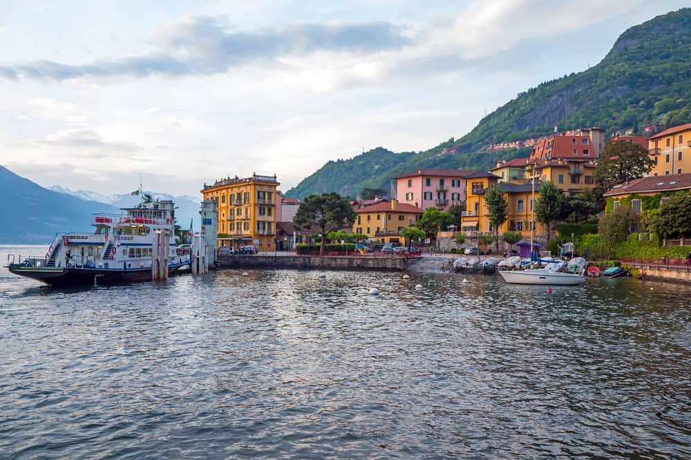 The ferry port in Varenna Lake Como, with a ferry in dock