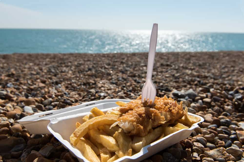 A box of fish and chips to be eaten on the beach