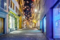 A street in the old town lit up in winter