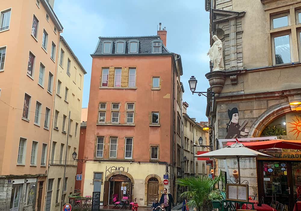 Part of Vieux Lyon.  You see the old buildings and a cafe/restaurant on the corner. 