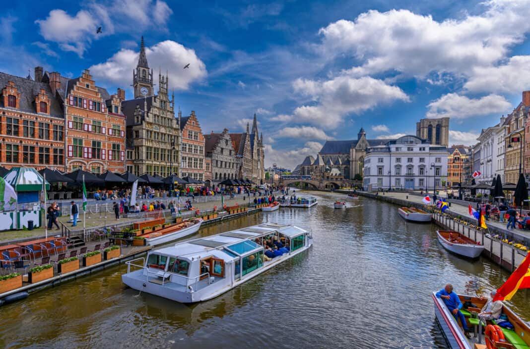 Boats along the river in Ghent - getting around by boat is a perfect way to see Ghent in one day