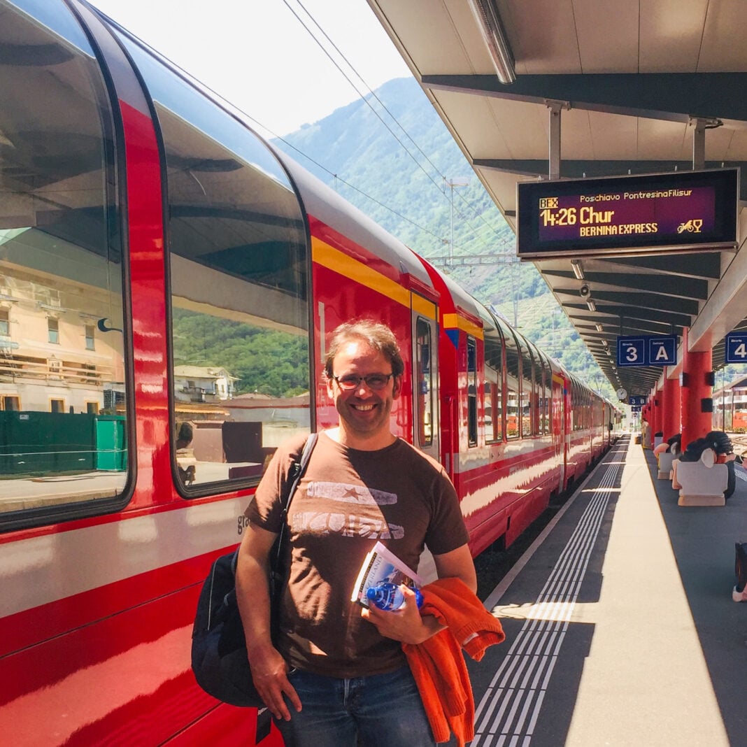 My partner standing by the Bernina Express train - this is covered in the Swiss Travel Pass
