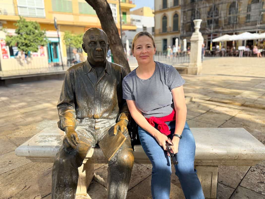 Me with the Picasso statue on a bench